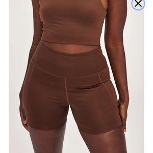 Girlfriend collective high rise short in earth